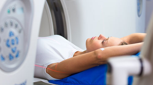 Woman receiving a PET/CT Scan in Oklahoma